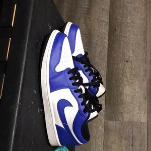 Blue and White Air Jordan 1 lows. size 9 men. Does have pink marking above ns
